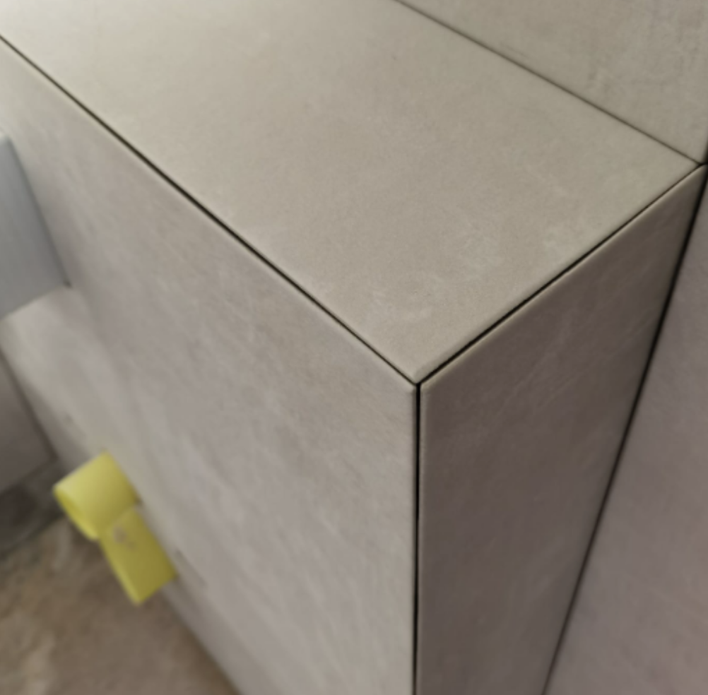 detalle constructivo alicatado porcelánico inglete 45 grados ejecución directa barcelona